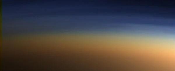 صورة تظهر طبقات من الضباب في الغلاف الجوي للقمر تيتان بالألوان الحقيقيّة