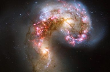عثر العلماء على مجرة تدور ببطء في الكون المبكر. استخدام تلسكوب جيمس ويب الفضائي لاستكشاف الفضاء. استكشاف مجرة MACS1149-JD1